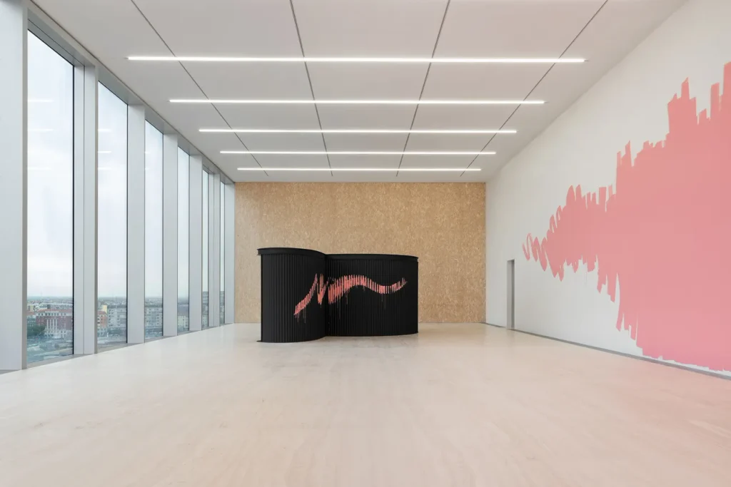 Exhibition view of Atlas, Torre – Fondazione Prada, Milano. Alex Da Corte, Mouse Museum (Van Gogh Ear), 2022, wood and corrugated aluminum, Plexiglas, display case with 121 objects, sound; Housepainter II, 2025, foam, plywood, resin, silicone, faux fur, hair, steel, paint, hardware, muslin, glass. Photo Delfino Sisto Legnani – DSL Studio. Courtesy Fondazione Prada
