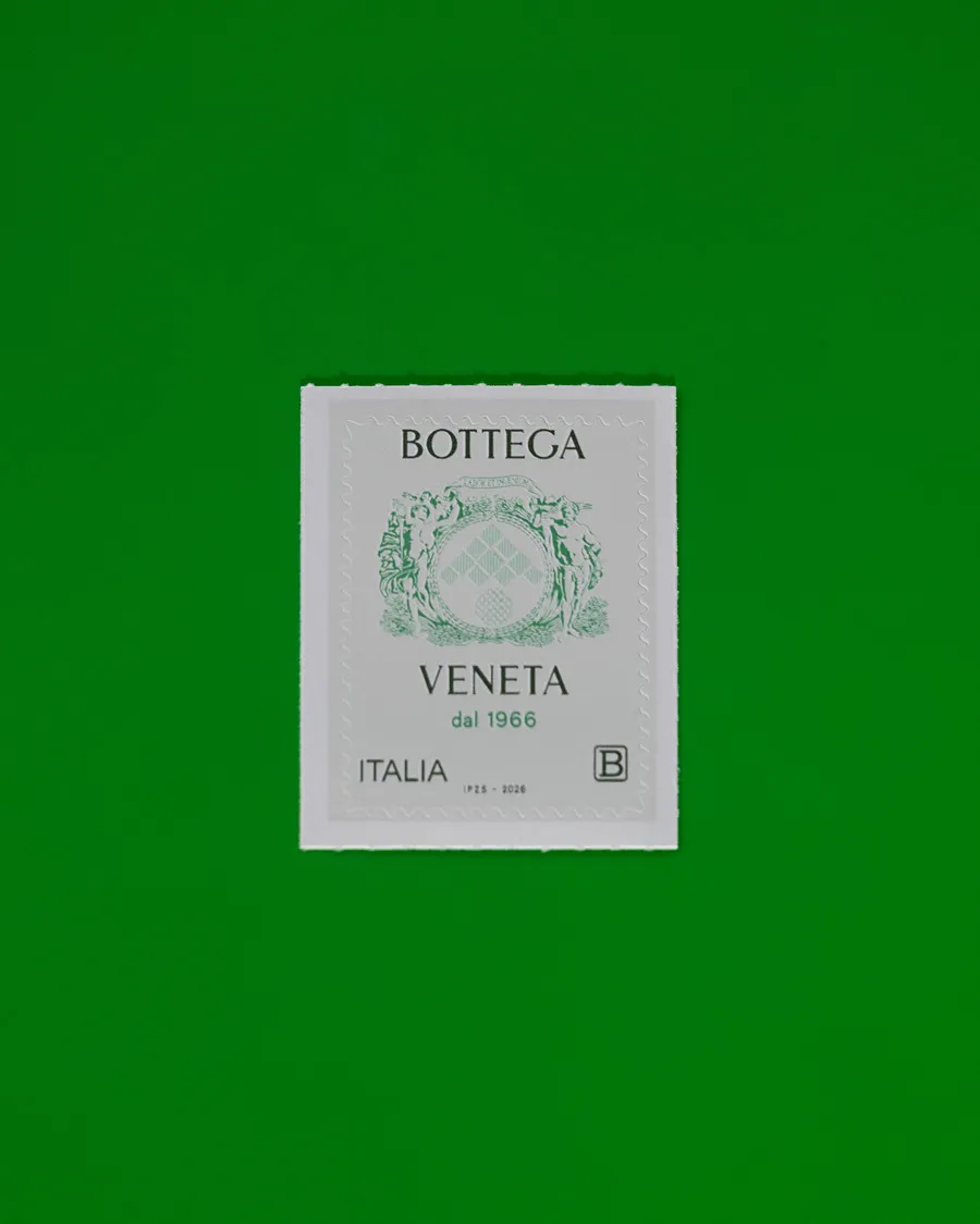 The commemorative stamp for the sixtieth year of Bottega Veneta, with the house crest in dark green and the motto Labor et Ingenium. Courtesy Bottega Veneta